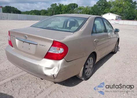2002 Toyota Camry Xle z USA, uszkodzony, nr VIN 4T1BE32K12U062959